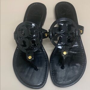 Tory Burch Black Sandals with Medallion Design